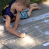 Students at Summer Splash Camp #2 Treble Clef Note Identification Drawing Notes on Staff with Sidewalk Chalk