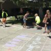 Students completing driveway obstacle course at Summer Splash Music and Piano Camp