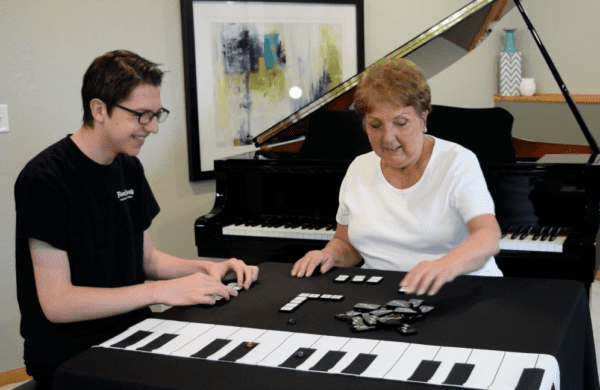 Sally Ritchie and Brandon Playing Triple Threat Tiles Key Signatures