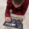 Student Writing Chord on Keyboard and Staff on Lead Sheet Lab Game Board